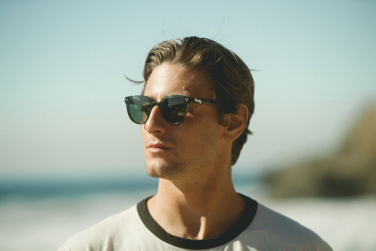 Man in sunglasses looking into the distance